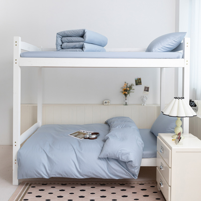 Cama de algodón de color puro para estudiantes universitarios de tres piezas dormitorio de algodón puro sábana individual funda de edredón ropa de cama 2025 nuevo estilo