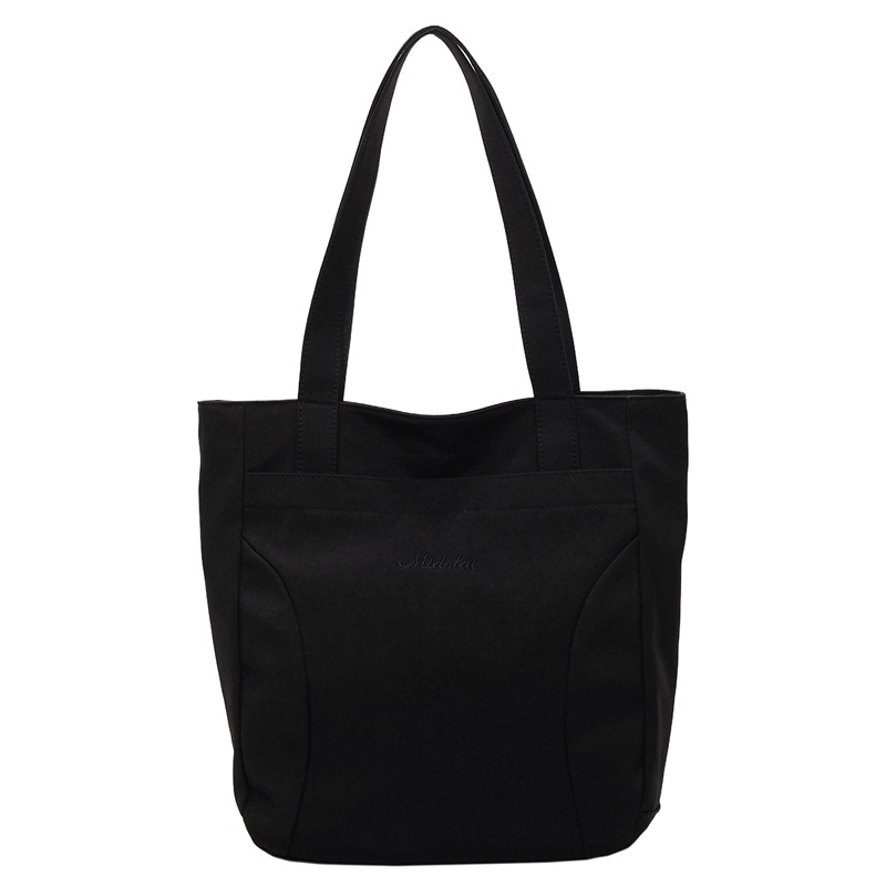 Bolsa de lona para mujeres nuevo estilo japonés retro simple de color sólido gran capacidad bolsa de transporte universal mochila universitaria