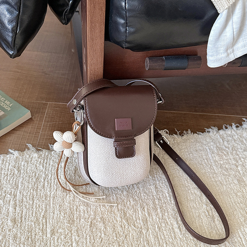 Bagos de silla de nicho de alta calidad para mujeres 2026 nuevo bolso de teléfono móvil ligero de lujo extranjero mini viaje mochila de hombro