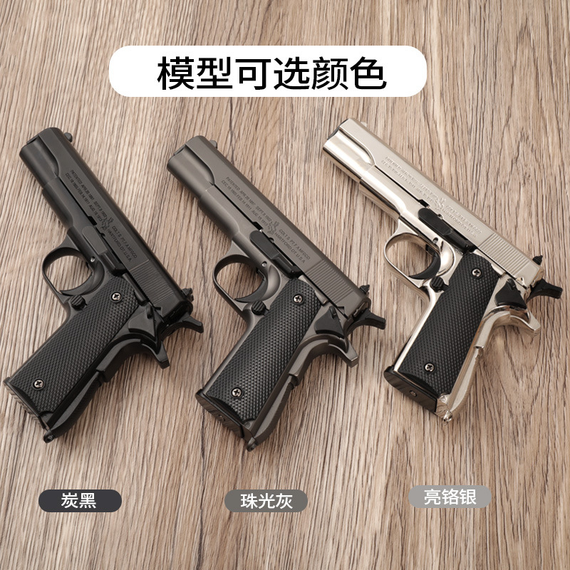 Modelo de aleación 1:2.05 de la pistola de juguete Seiko Colt M1911 con expulsión de casquillos, desmontable, ornamental, sin disparos.