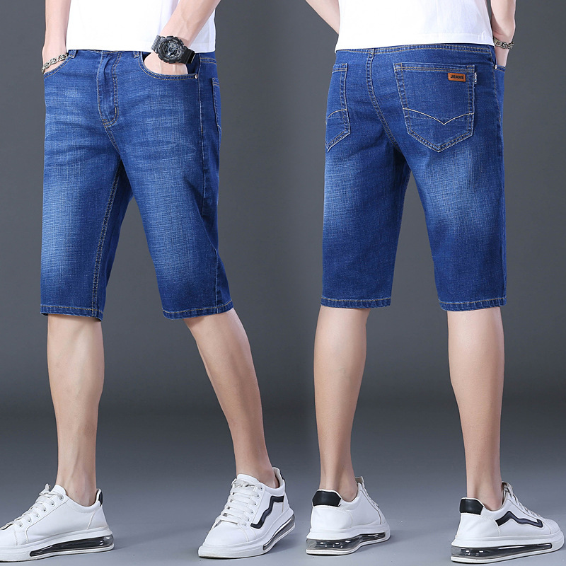 夏の薄いタイプの7分のズボンの男性のまっすぐな筒の紳士服のデニムのショートパンツの弾力性は夏の青年の中でズボンを修理します。|undefined