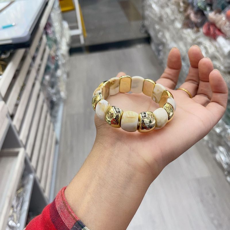 ヨーロッパとアメリカのファッショナブルなアクリルブレスレットゴールドスプライシングエルボブレスレット湾曲した竹チューブマルチカラーレトロブルーミングブレスレット女性用|undefined