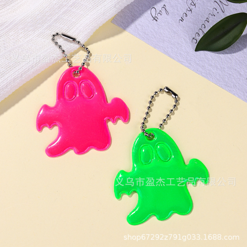 Amazon nuevo colgante transfronterizo pequeño estilo fantasma extraño lindo viaje nocturno llave reflectante de seguridad