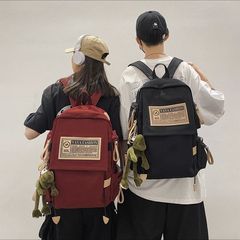 新型のかばんの女性の大容量のアメリカの復古の中学高校の学生のリュックサックの香港風の潮流のカップルの旅行のリュックサック