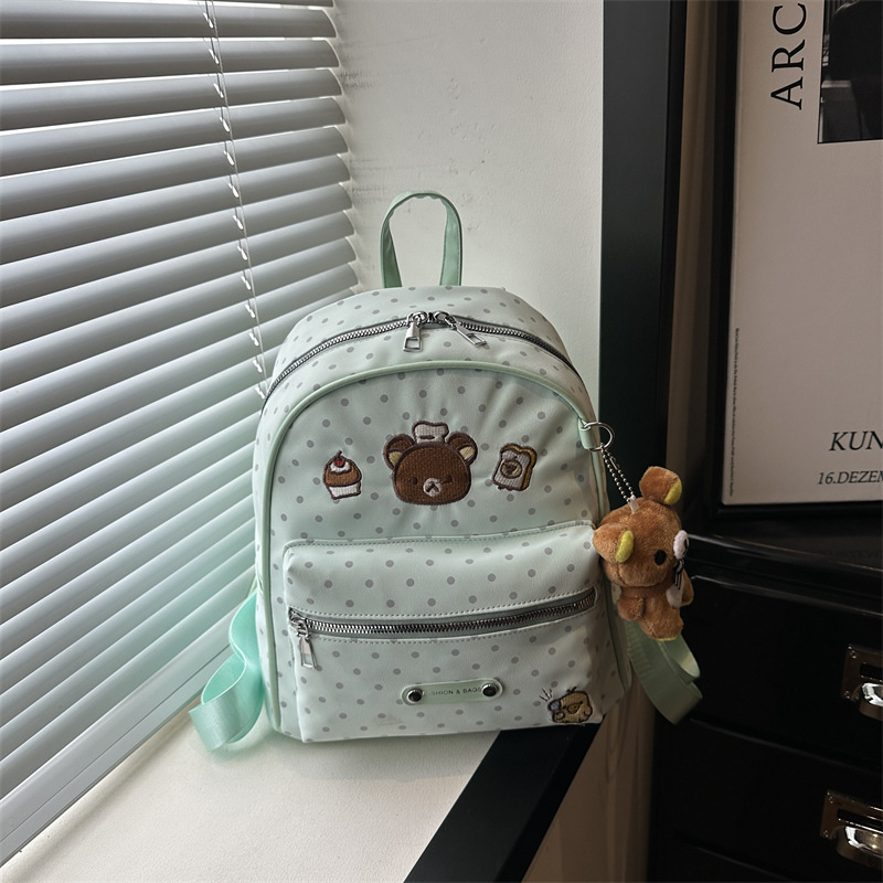 Mochila de la universidad de punto de tormenta para mujeres 2026 nueva moda mochila de dibujos animados de verano dulce chica mochila pequeña