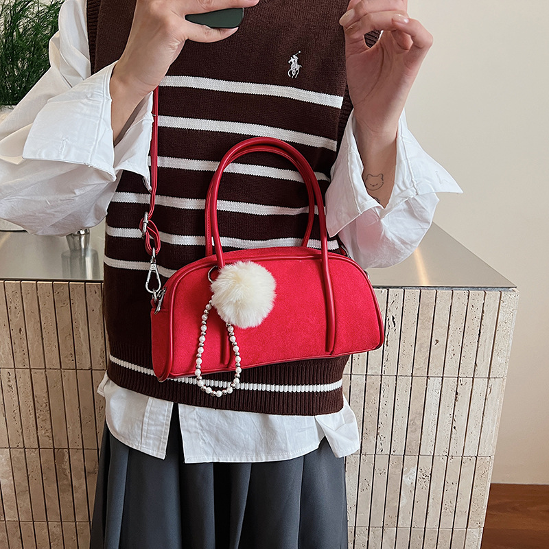 2025 otoño y invierno texturas de seda de moda retro bolso de bolos de estilo exterior de color puro bolso de viento