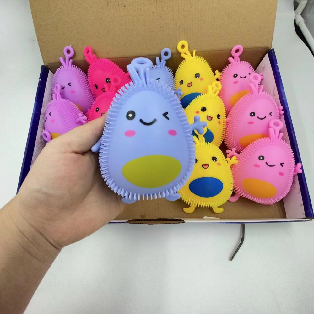 Dibujos Animados luminoso pellizco música descompresión muñeca lindo aguacate juguete decoración nuevo flash bola elástica lote