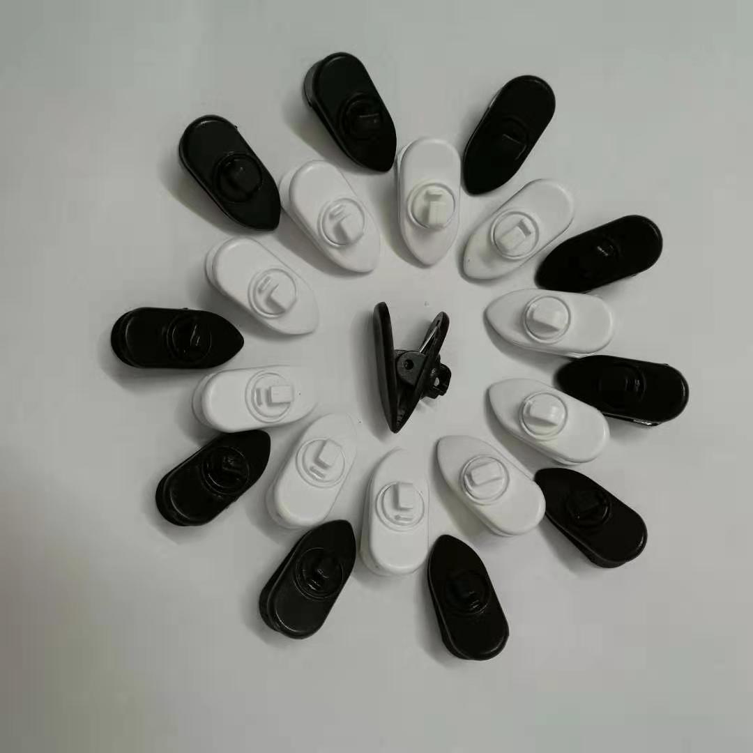 源头厂家现货供应旋转耳机线夹 面条线夹 塑料耳线夹环保衣领夹