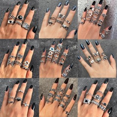 Cross-border alloy chain ring retro crying face ring 9-piece set poker ring hollow heart ring wholesale