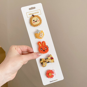 Hermosos clips de cabello de color para niños coreanos de alto nivel sensación de arco de niñas bolsa de tela no daña clips de cabello de bebé