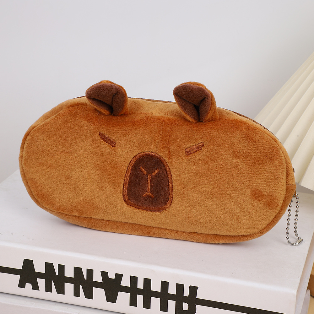 Bolso de lápices de felpa Kapibala de estilo explosivo Bolso de papelería para niños de carpincho de dibujos animados de gran capacidad Bolso de almacenamiento de suministros escolares