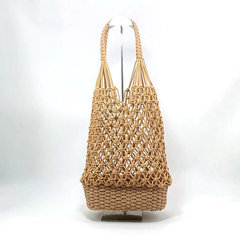 New hollow bucket hand-woven straw bag women's shoulder handbag ins style fishnet forest beach bag