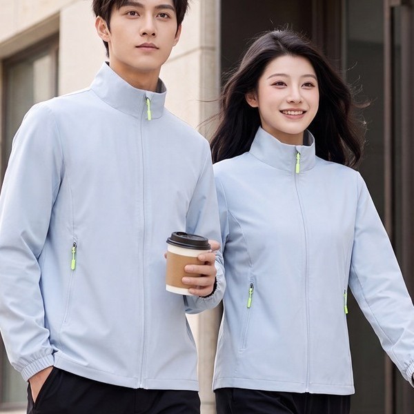 New outdoor sports windbreaker for men and women, featuring a stand-up collar, zipper closure, quick-drying fabric, sun protection, long sleeves, and suitable for team-building activities