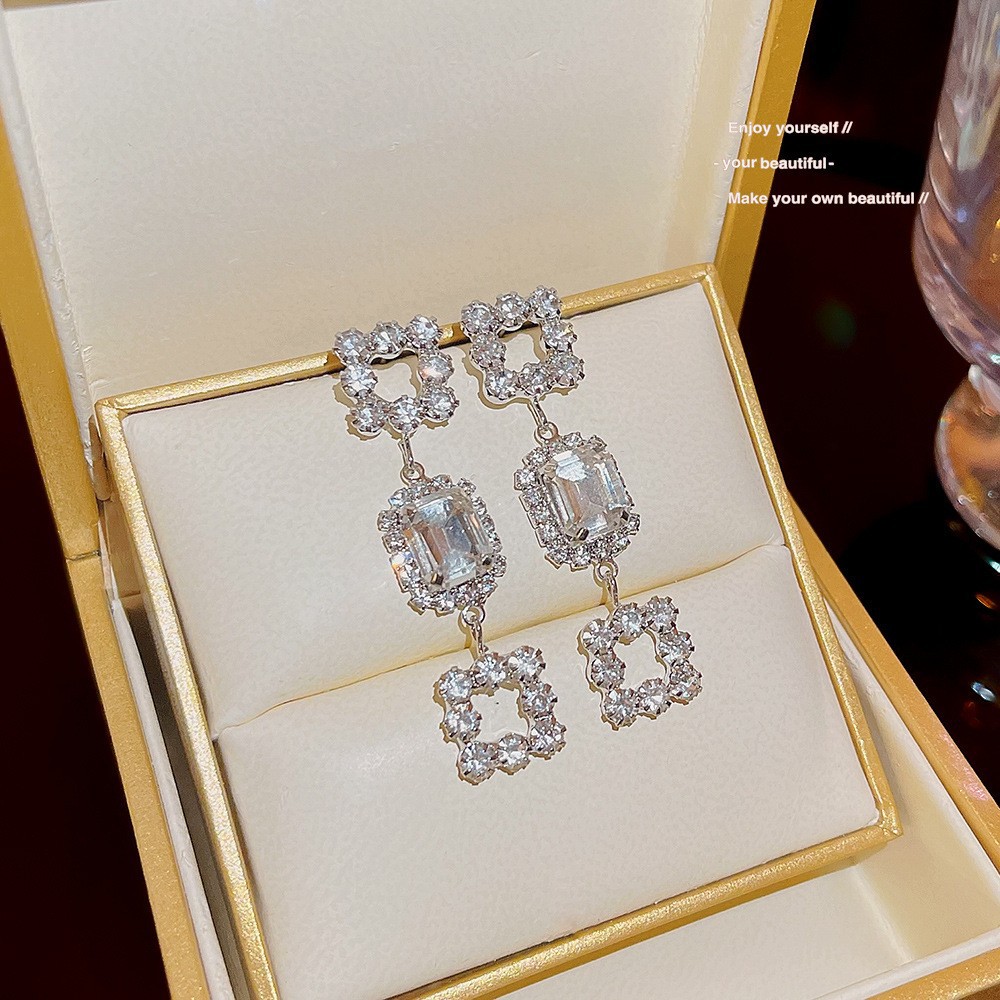 S925 aguja de plata elegante borla pendientes de alta gama simple cara de adelgazamiento pendientes de todo fósforo estilo coreano nuevos pendientes de moda al por mayor