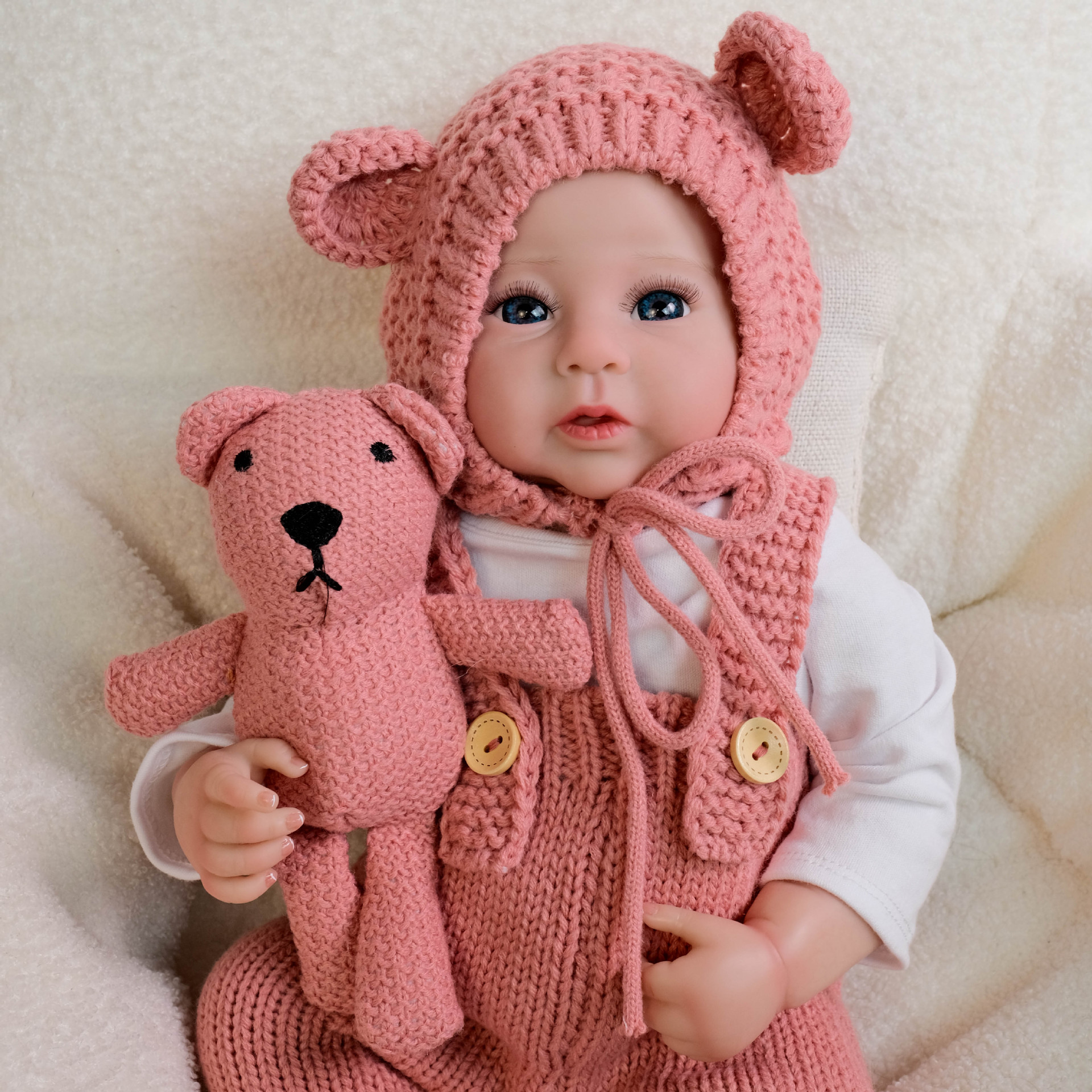 NPK19inch mono rosa muñeca de simulación Raven regalo para niños fuente de comercio electrónico transfronterizo