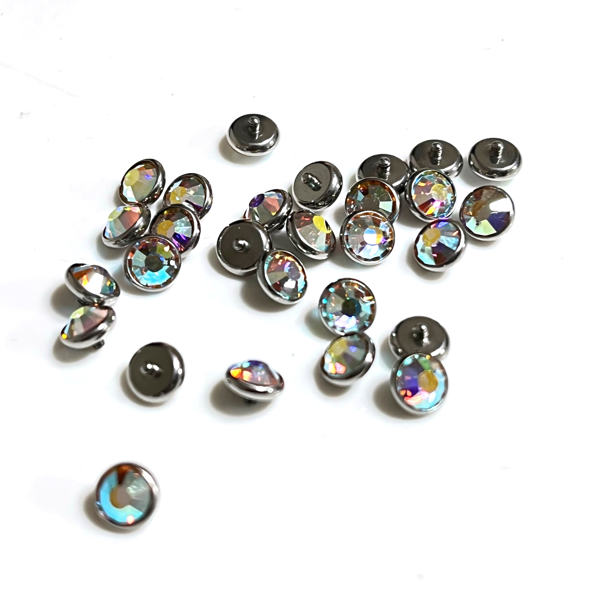 G23チタン埋釘盤リップルドリルカップはチェコドリルのピアスの外歯f136チタン合金の人体穿刺アクセサリーをはめ込んでいます。