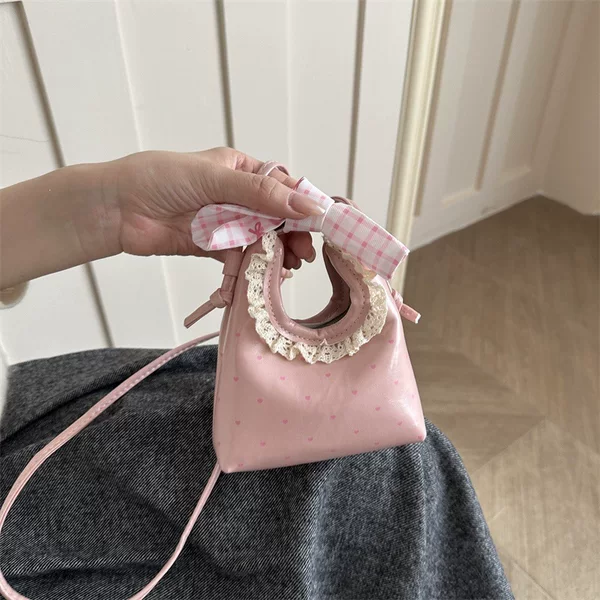 Fresh and stylish bowknot girls' shoulder bag, fashionable lace handbag, heart-shaped polka dot mini children's bag