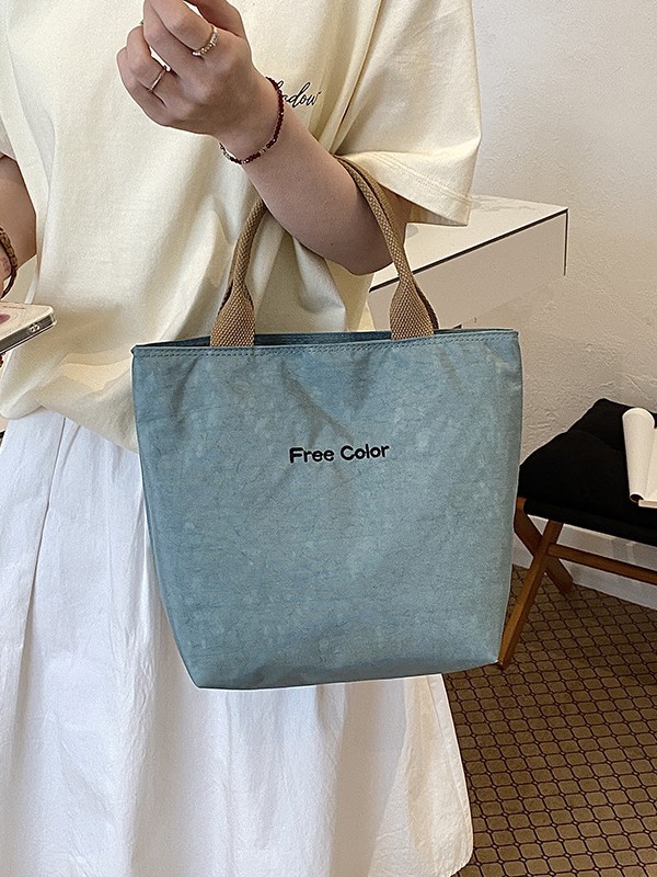 Nicho de diseño nuevo bolso de nylon de color sólido portátil de gran capacidad simple ocio versátil bolso de compras de viaje diario
