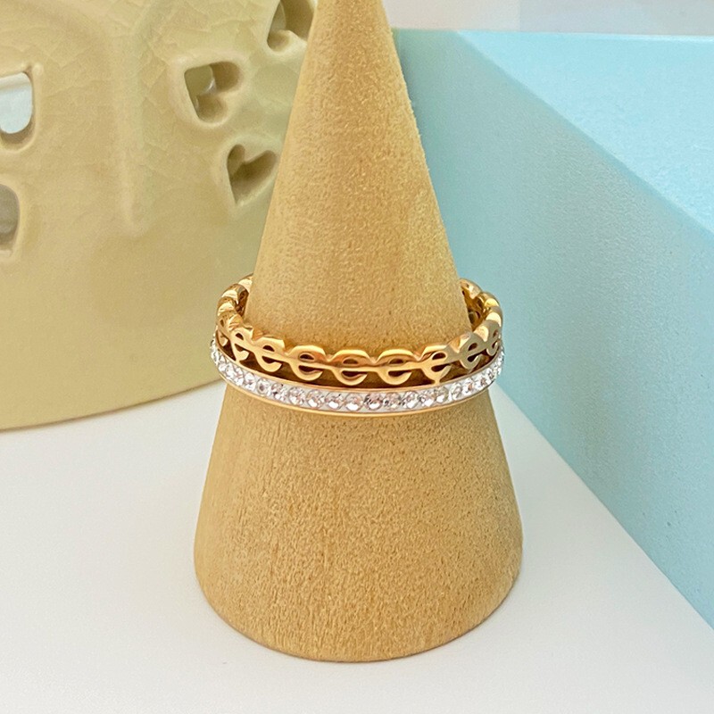 Japanese and Korean e-letter hollow mud diamond ring titanium female steel micro-diamond double-row finger ring ins English zircon tail ring factory