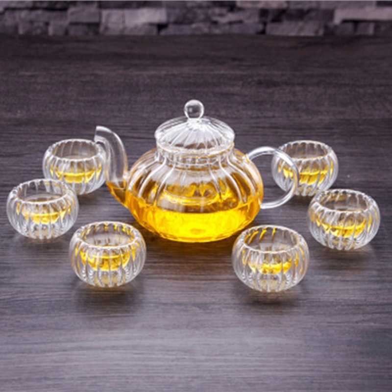 Venta al por mayor de borosilicato resistente al calor juego de té de vidrio engrosado Filtro de flores y hierba tetera a rayas calabaza olla traje de entrega de una sola pieza