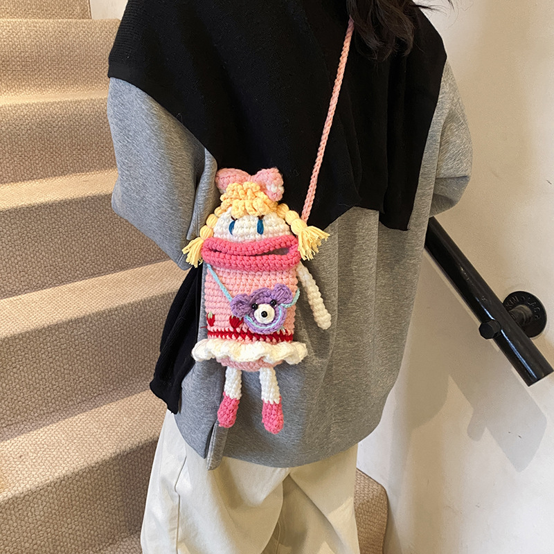 Bolsa de hombro de niñas gancho de lana terminada, muñeca de boca grande linda, mochila, otoño y invierno, nueva bolsa para niños