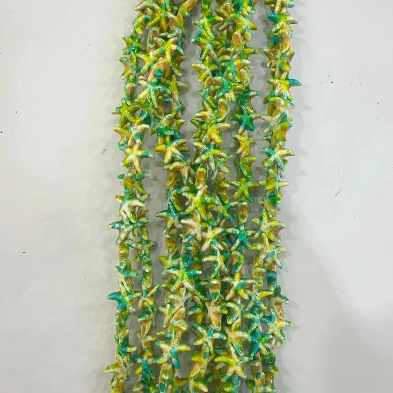 Ventas transfronterizas de coloridas estrellas de mar de piedra de pino cuentas semiacabadas DIY accesorios accesorios materiales de joyería hecha a mano