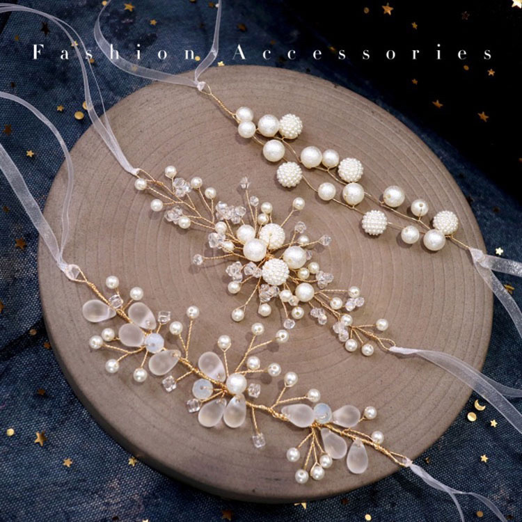 Handcrafted, minimalist wrist flowers in white pearls—perfect as bridal or bridesmaid gifts for sisterhood gatherings, weddings, and celebratory events.