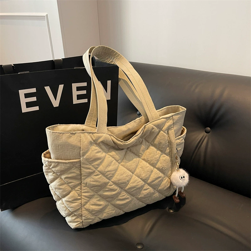 Water repellent protective bag with diamond pattern, universal one-shoulder bag