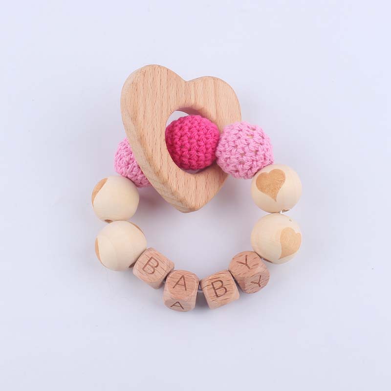 Bebé suministros de dibujos animados de haya amor mordedor creativo DIY dibujos animados amor patrón mordedura pulsera teether juguete