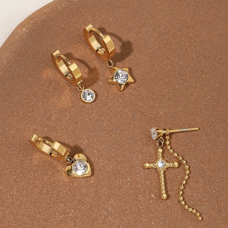 Set di orecchini in acciaio inox con croce cuore e stella_voghion.com