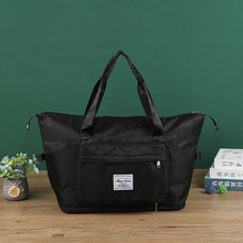 厂家牛津布旅行袋行李收纳包大容量便携黑色整理手提袋可批发