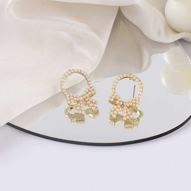 Simple Star Inlaid Pearl Alloy Earrings display picture 4