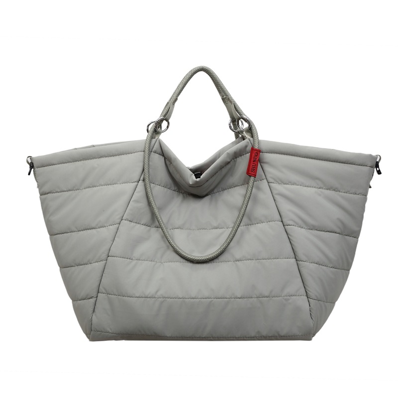 Simple primavera y verano nuevo 2026 nube hombro bolsa de gran capacidad de viaje de viaje de acondicionamiento físico bolso portátil mujer