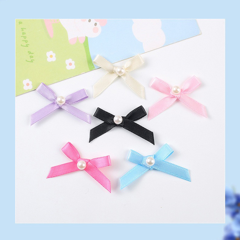Creativo transfronterizo Pearl Bowknot Spot Pastel al por mayor Postres para hornear Ballet Decoración Plug-in Accesorios para el cabello de bricolaje