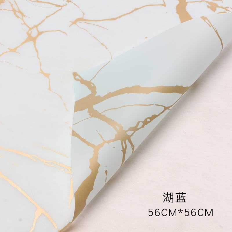 Patrón de mármol dorado Papel de embalaje de flores impermeable engrosado Papel mate Papel de embalaje de ramo Papel de embalaje Hansu al por mayor