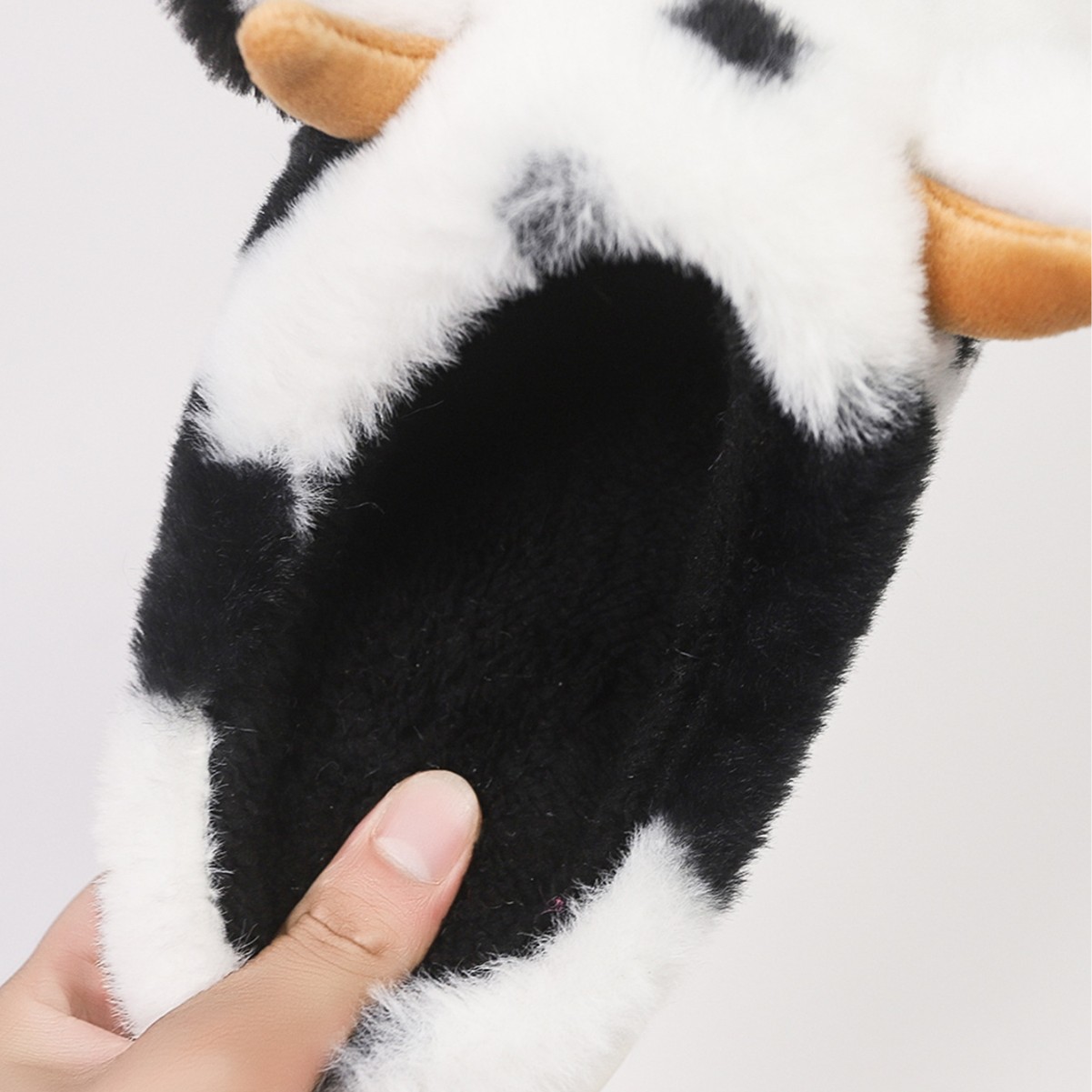 Zapatillas de algodón interior de vaca de manchas transfronterizas para mujeres de otoño y invierno calentamiento de peluche grueso zapatillas casuales