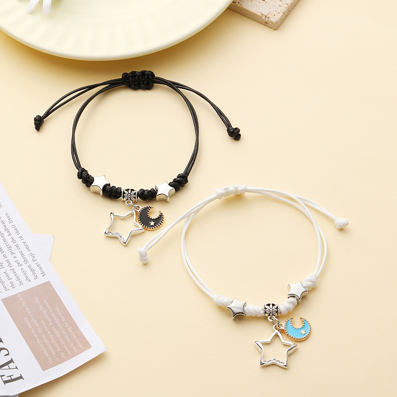 Pulsera pareja corazón hueco trenzada ajustable blanco negro_voghion.com