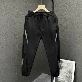 夏季薄款宽松休闲裤男条纹拼接小脚九分裤痞帅潮牌束脚哈伦运动裤