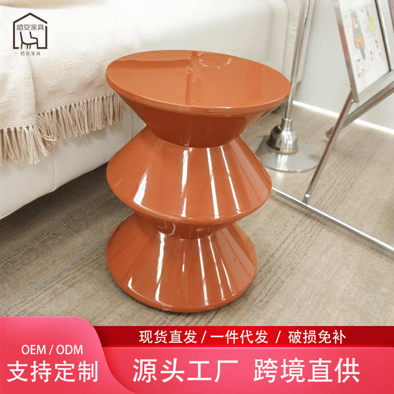 Ins sofá lado de varios pequeños taburetes rojos pequeños taburetes redondos creativos de cabecera de la mesa de té adornos de fábrica personalizados