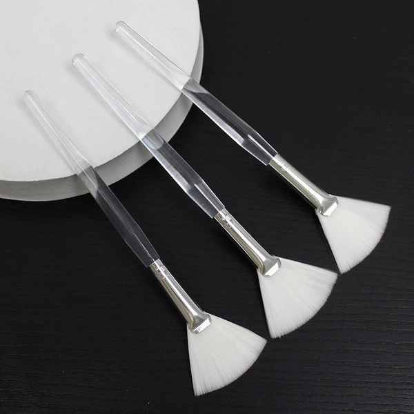 Transparent handle white bristle fan brush