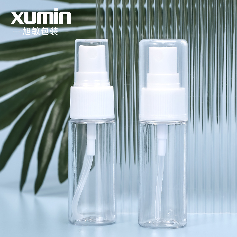 Xumin embalaje en stock 20ml transparente botella de spray para mascotas muestra blanca rayada sub-botella pequeña/botella de spray de tapa completa
