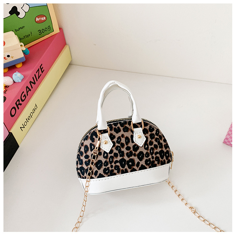 Exquisita y compacta bolsa de niña estampado leopardo extranjero mini bolso de cadena bebé nuevo estilo coreano bolso de conchas para niños