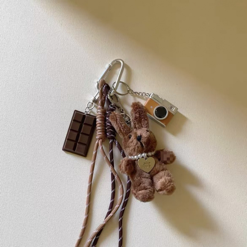 Bolsa de viento, bolsa de colgante, muñeca de viento, cuerda de nylon colgante, conejo, cachorro, cámara, llavero, mochila escolar