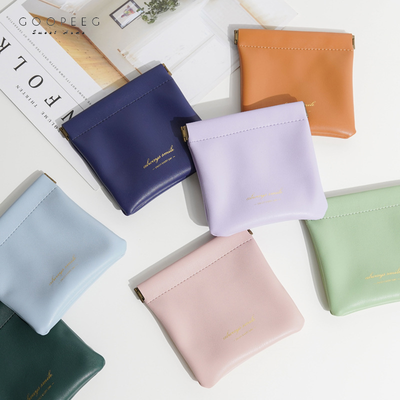 弹簧片PU耳机自动束口储物袋无线耳机数据线便携式弹片袋