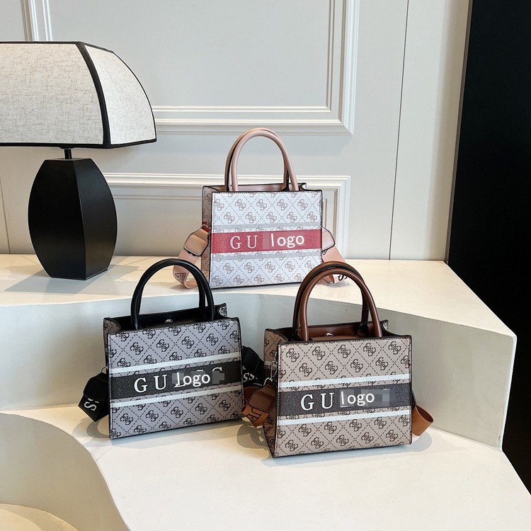 Bolso Tote impreso de comercio exterior transfronterizo Bolso bandolera de viajero de gran capacidad para mujer Bolso de letras clásicas de tendencia europea y americana