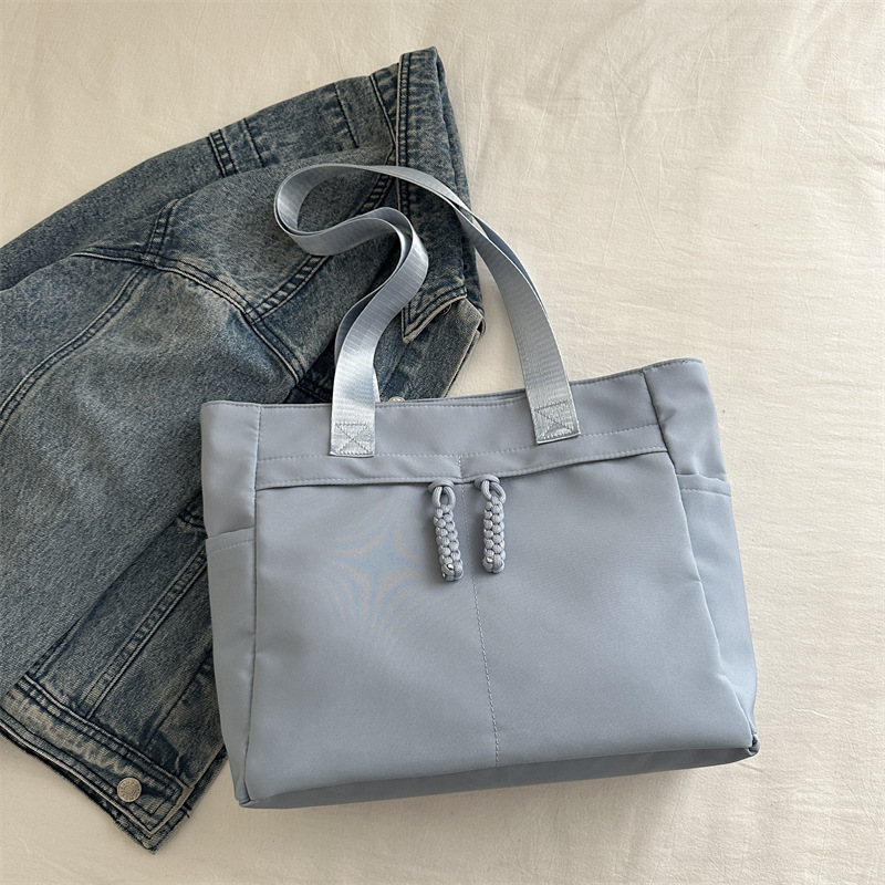 2024 nuevo bolso de tela de gran capacidad para mujeres extranjeras bolso de lona de moda red de nicho de alta calidad bolso de hombro