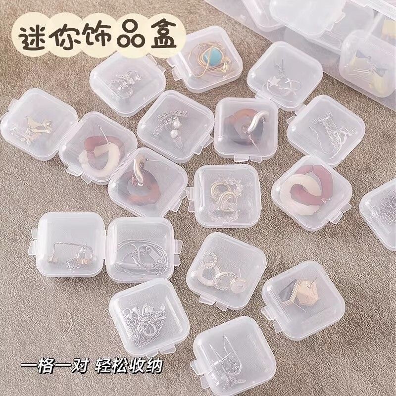 Jewelry earplugs are individually packaged in small flip-top boxes, small square boxes, transparent jewelry storage boxes, and transparent square boxes Jewelry earplugs are individually packaged in small flip-top boxes, small square boxes, transparent jewelry storage boxes, and transparent square boxes