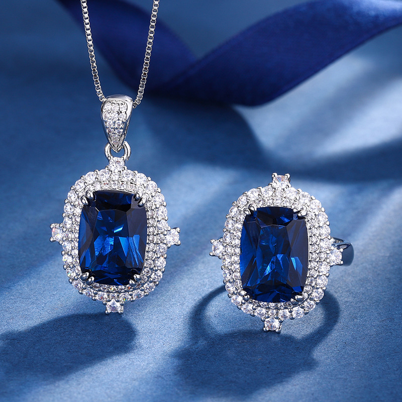 2023 nuevo estilo Zhuang Sheng joyas cobre inferior chapado en oro simulación azul señaló cristal retro europeo y americano traje femenino piedra principal 10*14