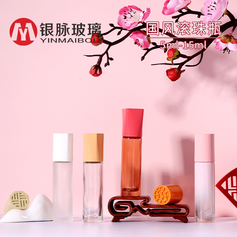 Transparent rollerball golden perfume contains rose