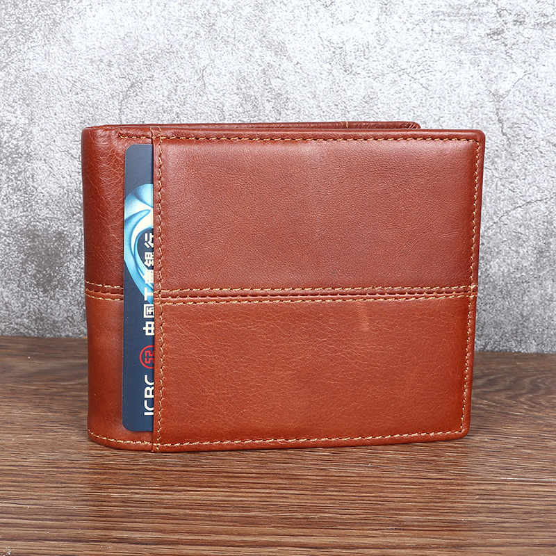 Hombres cartera horizontal de cuero genuino cartera retro moda casual primera capa de costura de piel de vaca corto tríptico cartera al por mayor